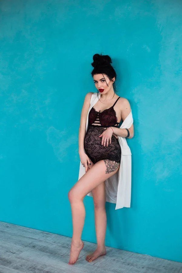 Body modellante in pizzo con elastico