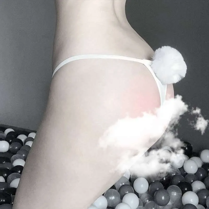 Mini-jupe plissée à carreaux avec culotte à pompons