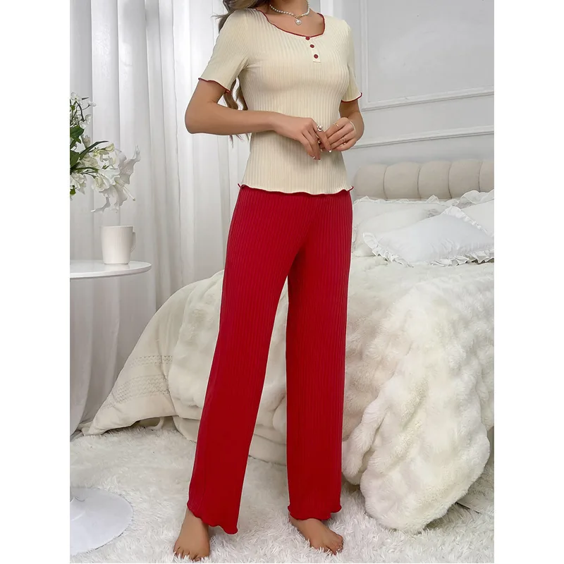 Conjunto de top de tirantes y pantalón de punto acanalado
