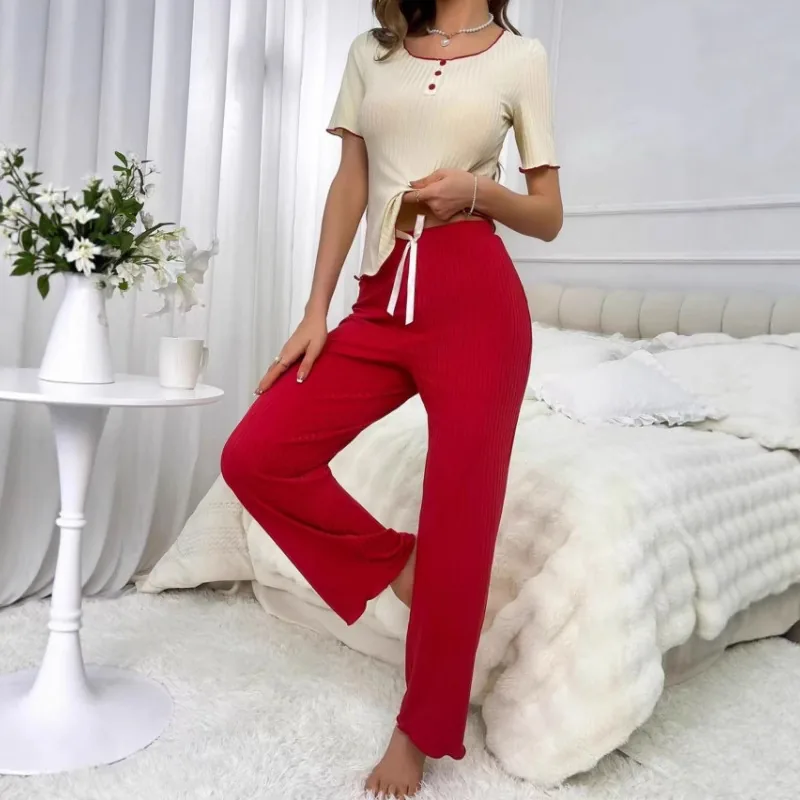 Conjunto de top de tirantes y pantalón de punto acanalado