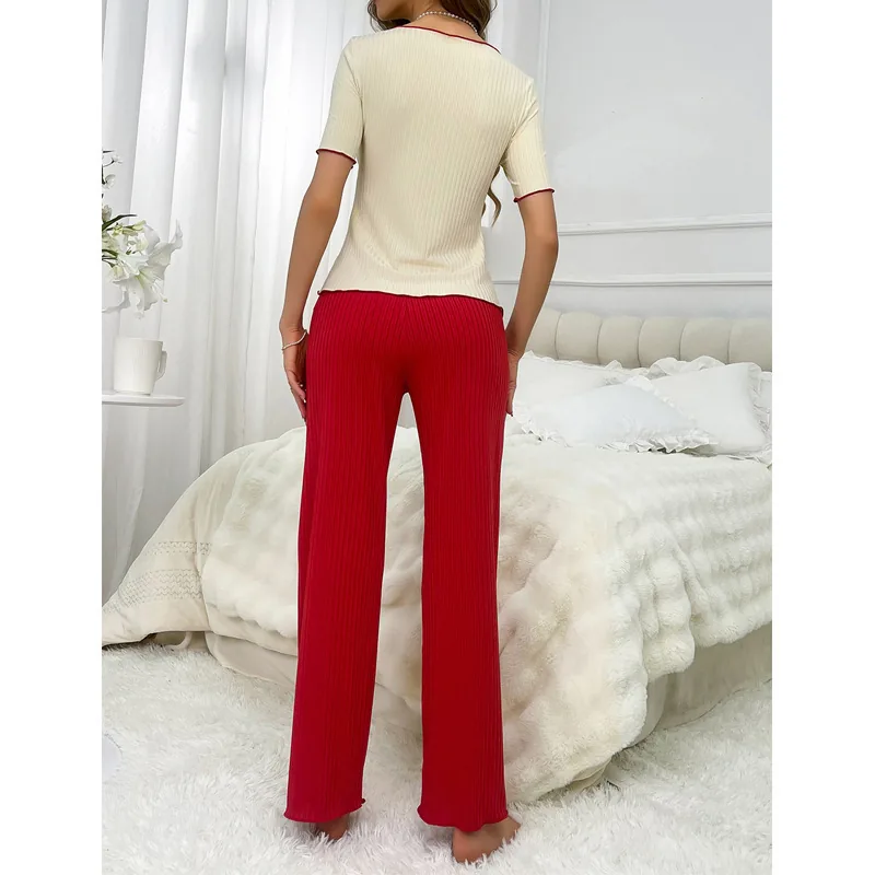 Conjunto de top de tirantes y pantalón de punto acanalado