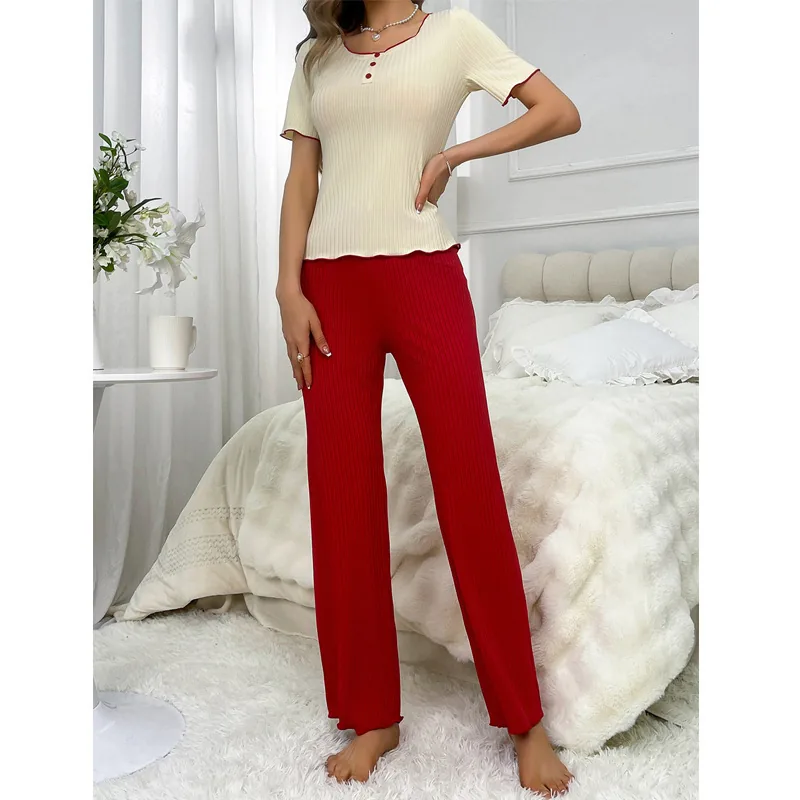 Conjunto de top de tirantes y pantalón de punto acanalado